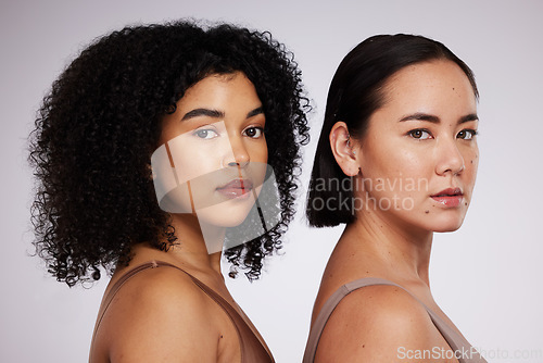 Image of Women, face and diversity with portrait, skincare for different skin color and unique with beauty isolated on studio background. Natural cosmetics, glow and dermatology, inclusion and facial care