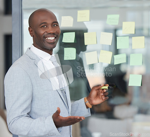 Image of Black man, working portrait and board writing for corporate law schedule with happiness. Lawyer, company strategy and sticky notes of a law firm worker in a office or conference room feeling happy