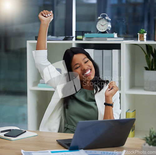 Image of Celebration, laptop and professional black woman in the office with success, achievement or goal. Happy, smile and African business employee on a computer celebrating her job promotion in workplace.