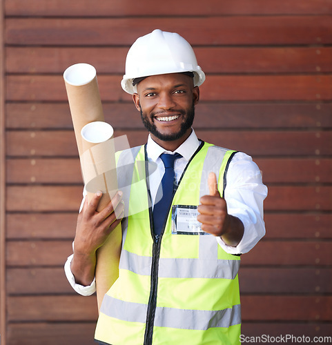 Image of Architecture, construction and portrait of a black man with a thumbs up for building, success and win. Thank you, motivation and African engineer with a hand sign for engineering goal and maintenance