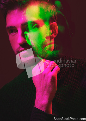 Image of Double exposure, color and portrait of a man thinking isolated on a dark background in studio. Texture, design and face of a man with colorful overlay, creativity and digital concept on a backdrop