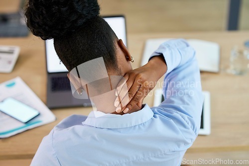 Image of Black woman, neck pain and fatigue at office desk stretching or massage while tired or burnout. Anatomy or health problem of employee or business person with hands on body or spine injury accident