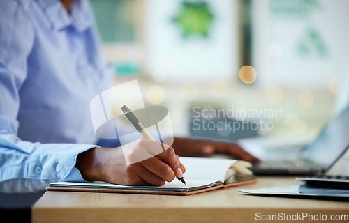 Image of Hands, writing or notebook for financial data, company budget or insurance accounting in business office. Zoom, black woman or calculating finance worker and notes, tax schedule or fintech technology