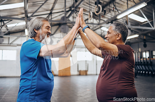 Image of Elderly men, gym and high five for fitness, teamwork motivation and diversity with friends happiness. Senior training partnership, asian and black man for mma workout, exercise and team building goal