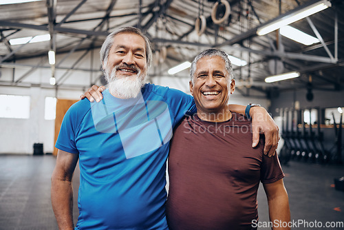 Image of Senior men smile, gym portrait and teamwork motivation for diversity, friends hug or happiness for wellness. Elderly fitness partnership, asian and black man at mma workout, exercise or team building