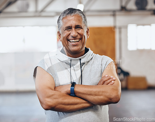 Image of Gym, fitness and portrait of old man with smile and crossed arms for motivation, wellness and cardio workout. Muscles, healthy body and face of senior male after training, exercise and sports goals