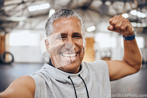 Image of Muscle, exercise and selfie portrait of old man in gym show biceps for motivation, wellness and cardio workout. Smile, healthy body and face of senior male after training, sports and fitness goals