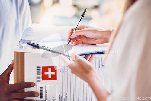 Image of Delivery, signature and box parcel for a customer for an online order or ecommerce medicine shopping. Cargo, shipping and courier driver giving a medical package to a woman for signage at front door.