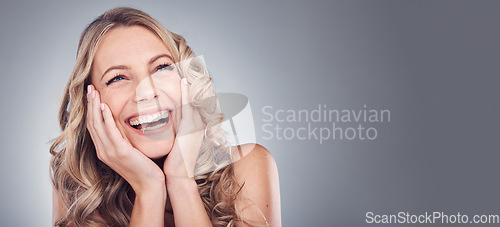 Image of Beauty, happy and face of woman excited for cosmetics product placement, luxury makeup mockup or skincare glow. Dermatology mock up, spa studio or laughing promotion model isolated on grey background