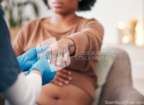 Image of Pulse device on finger, pregnant woman and doctor checkup for blood oxygen level measurement. Medical professional testing in hospital, healthcare for pregnancy or nurse consulting african mother