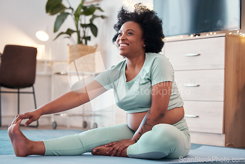 Image of Yoga, pregnant and black woman stretching legs in home for flexibility, health or fitness. Pregnancy, zen pilates and future mother or mama thinking while training, exercise or workout for wellness.