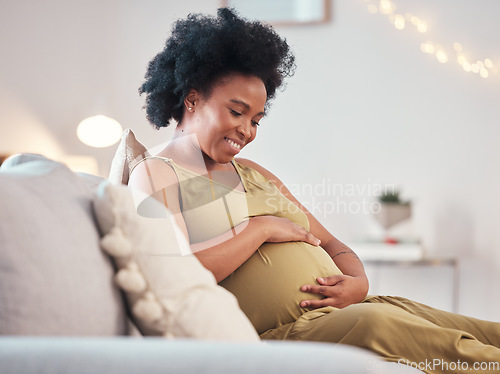 Image of Pregnant, love and black woman on sofa in home with hope and care for unborn baby. Pregnancy, prenatal motherhood and mama or future mother relax in living room and touching belly for infant health.