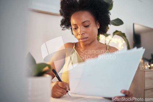 Image of Bills, paperwork and black woman writing a report, working on tax and home accounting. Finance, loan and African girl with documents for payment, contract and entrepreneurship business investment