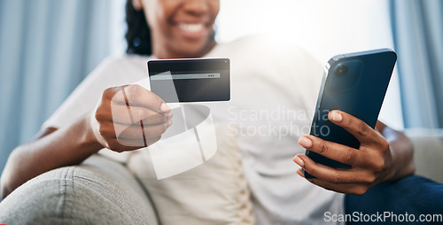 Image of Phone, online shopping or black woman with credit card for payment, internet purchase or ecommerce in living room. Fintech, happy or girl on smartphone for trading, banking or invest on home sofa