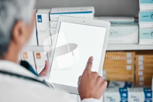 Image of Digital tablet, mockup and hands of pharmacist for medicine, stock and checklist, prescription or pills. Copy space, screen and female health expert online for internet, search and app for inventory