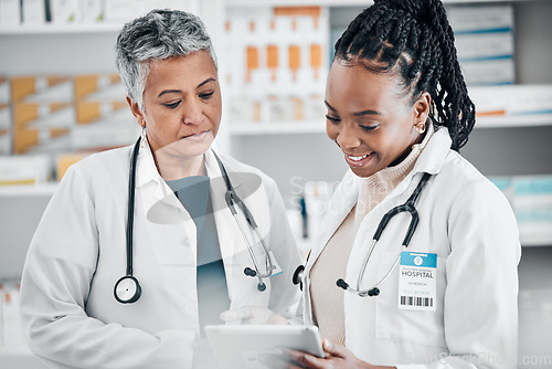 Image of Pharmacy, tablet and pharmacist women research for healthcare, telehealth services and medicine teamwork. Technology, healthcare and doctors on internet or e commerce for medical pharmaceutical drugs