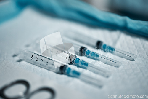 Image of Needle syringe, healthcare tools and surgery, medicine and medical tray with drugs, procedure and anesthesia closeup. Vaccine, health equipment and hospital with injection, science and medication