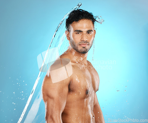 Image of Water, splash and portrait of model for beauty, skin and skincare cleaning body, muscle and topless. Istanbul, fit and wellness man with moisture, cleanse and hydration isolated in studio background