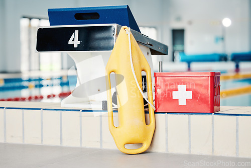 Image of Swimming pool, medical and lifeguard equipment for water safety, security or emergency for rescue. Safe swim tools for first aid help, protection and lifebuoy in preparation for rescuing or lifesaver