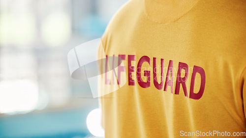 Image of Lifeguard, closeup and swimming pool safety at indoor facility for training, swim and exercise. Pool, attendant and water sports person ready for danger, protection or diving athletics with mockup