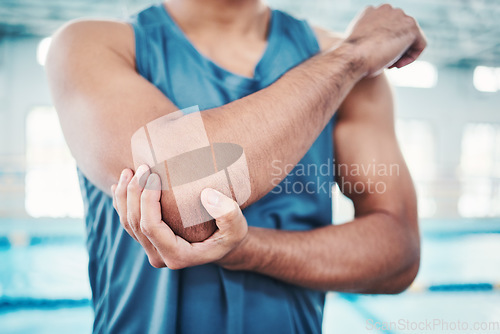 Image of Swimming pool, sports and man with elbow pain from injury, muscle ache and joint inflammation. Arthritis, medical aid and male hands with accident, strain or bruise from fitness, exercise or training