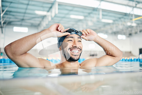 Image of Happy, man or relax in swimming pool with cap or goggles in sports wellness, training or exercise in body muscle. Workout, fitness or swimmer athlete with smile, water competition goals or healthcare