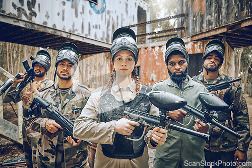 Image of Paintball, team portrait and woman leader with gun for sports game, competition or action challenge. Diversity men and female group for military, soldier or army mission in outdoor war battlefield