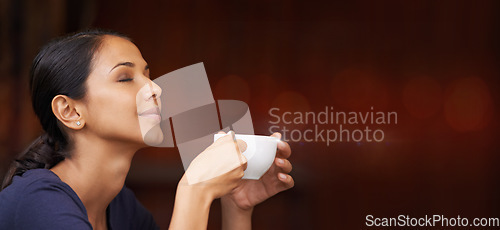 Image of Coffee, calm and woman smelling the aroma in a studio with mockup space for advertising or marketing. Peace, relax and female model from Mexico enjoying the scent of a cappucino by maroon background.