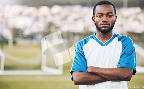 Image of Sports, black man and portrait of soccer player on field, focus and motivation for winning game in Africa. Confident, proud face and serious mindset at professional football exercise training match.