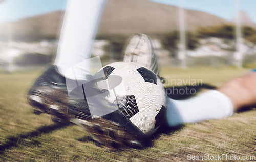 Image of Soccer, shoes and ball with motion blur, fitness on sports field, action and speed, tackle and training outdoor. Football player with match, people play team sport and energy with exercise closeup