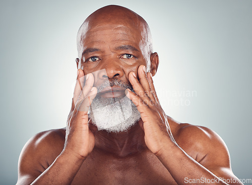 Image of Beard, skincare and senior man grooming and self care routine isolated in studio gray background. Facial, moisture and portrait of old person or model with smooth glow skin or face for wellness