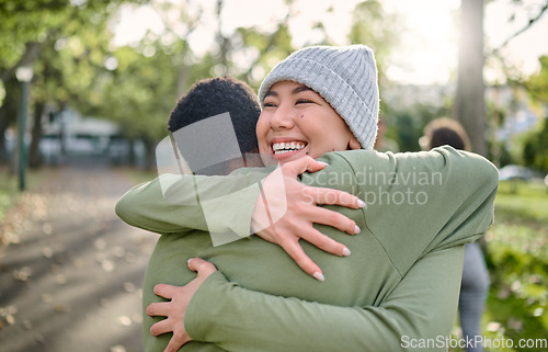 Image of Friends, hug and smile for relationship, support or care embracing love, compassion or friendship in nature. Happy woman and man hugging, smiling and enjoying embrace in happiness for partnership