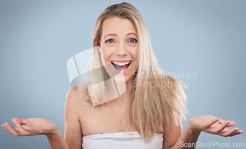 Image of Face, hair care and confused woman with product placement, mockup or advertising space in studio isolated on gray background. Beauty, portrait and female model with salon treatment, doubt or question