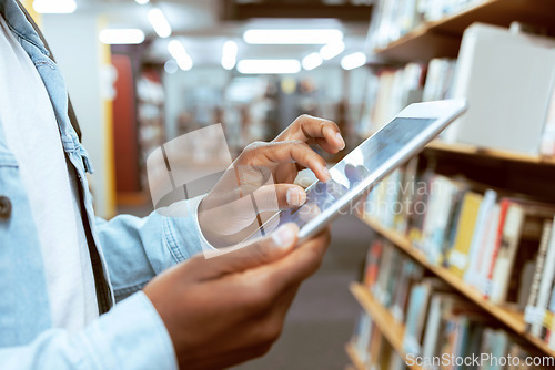 Image of Student hands, tablet zoom and library research of a black man at an education and knowledge center. University, college and study building with a person with technology looking at social media app