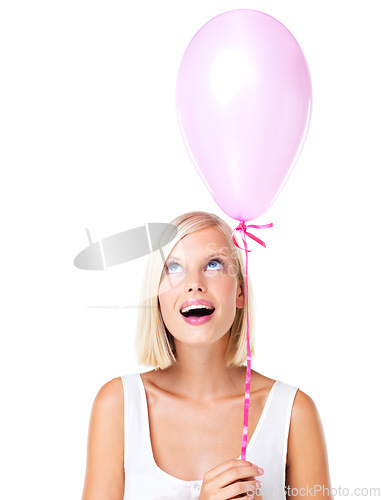 Image of Balloon, excited and young woman with birthday or valentines day present in studio. Isolated, white background and cute model with happiness and joy thinking with optimism and smile for party