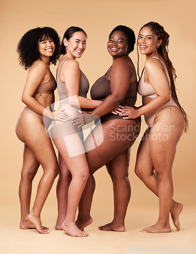 Image of Body, skin and diversity women portrait in studio for inclusion, beauty and power. Underwear model or friends group on beige background with cellulite, pride and motivation for self love it skincare