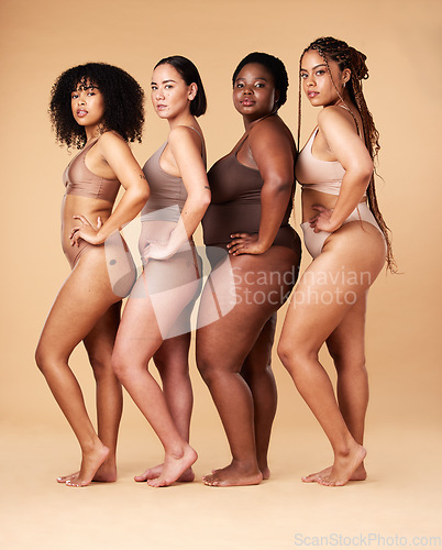 Image of Body positivity, skin and portrait of women group together for inclusion, beauty and power. Aesthetic model friends on beige background with underwear cellulite, pride and motivation for self love