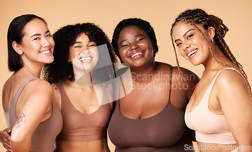 Image of Friends, diversity and beauty of women in underwear in studio isolated on a brown background. Portrait, lingerie and self love of body positive happy girls with makeup, cosmetics and healthy skincare