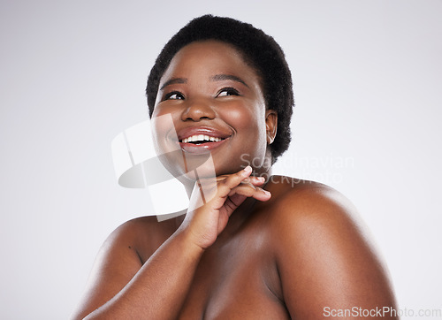 Image of Beauty, smile and face of black woman for wellness, skincare and luxury cosmetics in white studio. Spa aesthetic, dermatology and happy female plus size model with glowing skin, self love and makeup