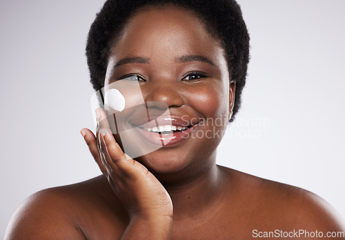 Image of Black woman, portrait and cream for skin in studio for cosmetic beauty, smile and happiness by background. Facial product, happy african model and skin glow with natural aesthetic for face wellness