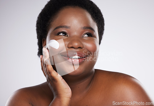 Image of Cream, face and beauty black woman isolated on a white background for skincare, product or cosmetics smile. African model or person with facial lotion, collagen .or dermatology sunscreen in studio