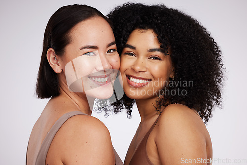 Image of Diversity, beauty and portrait of women for skincare, wellness and body positivity in studio. Dermatology, self love and face of Asian and black girl for luxury cosmetics, makeup and natural glow