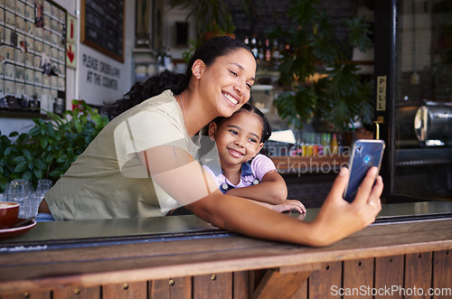 Image of Coffee shop, black family and selfie with a mother and daughter enjoying time together in a cafe. Photograph, picture and memories with a woman and happy female child bonding in a restaurant