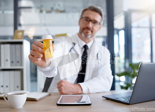 Image of Doctor hands, portrait and pills in hospital for healthcare, wellness and health in clinic. Medicine, medication and male physician holding medicinal drug product or prescription for healthy cure.