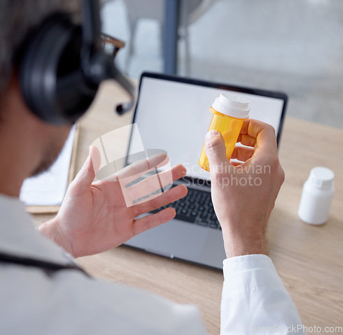 Image of Pills, headphones and doctor on laptop video call, webinar or online consultation. Computer telehealth, medication and hands of man with drug product, medicine or prescription on internet conference.