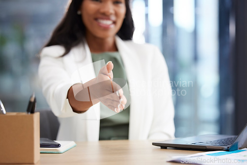 Image of Professional woman with a handshake gesture in office for welcome, onboarding or greeting. Corporate, career and African female employee shaking hand for partnership, deal or agreement in workplace.