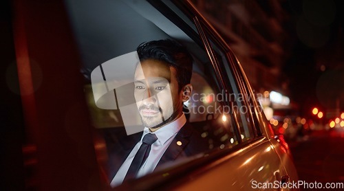 Image of Night, travel and business man in car relaxing, commuting and traveling after working. Transport, road and young male professional, passenger or businessman sitting in vehicle, motor or taxi in city.