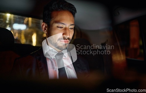 Image of Travel, night and business man in car relaxing, commuting and traveling after working. Transport, road and young male professional, passenger or businessman sitting in vehicle, motor or taxi in city.
