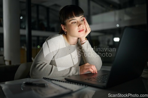 Image of Depression, bored or woman typing on laptop for online report, research or business proposal in an office. Burnout, lazy or tired worker reading sad news online, email or scrolling on social media