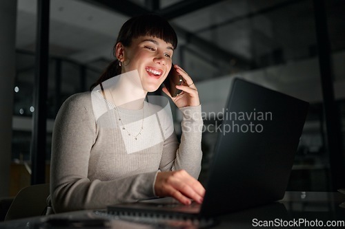 Image of Phone call, laptop and business woman talking, chatting or speaking to contact at night. Dark office, cellphone and female employee with mobile smartphone for networking, discussion or conversation.